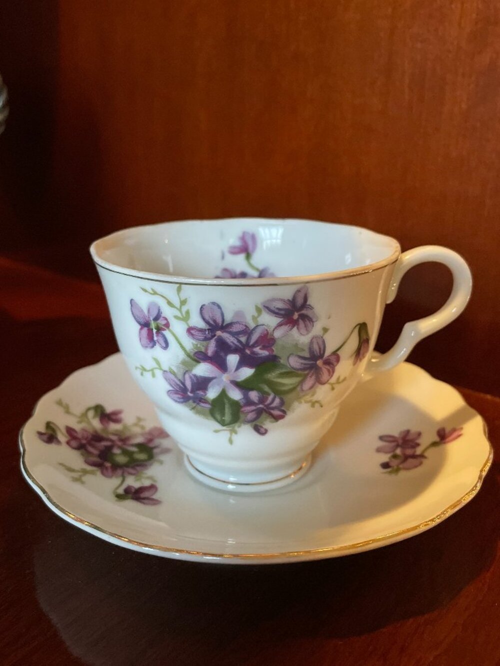 Lovely Enesco Teacup w/Floral Violet Design and Matching Scalloped Saucer